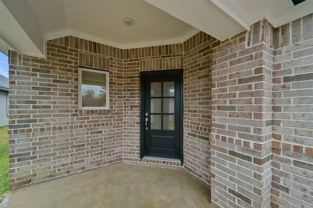 1650 Portia Ln, Conroe, TX 77301 - property entrance featuring brick siding