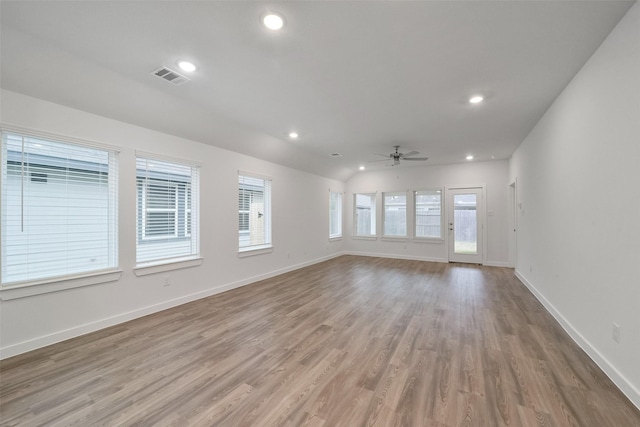 1650 Portia Ln, Conroe, TX 77301 - unfurnished living room with ceiling fan, visible vents, baseboards, light wood finished floors, and recessed lighting
