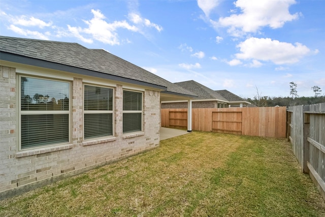 1710 Portia Ln, Conroe, TX 77301 - view of yard featuring a patio and a fenced backyard