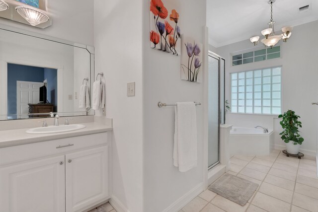 full bathroom featuring a garden tub, visible vents, a shower stall, vanity, and an inviting chandelier