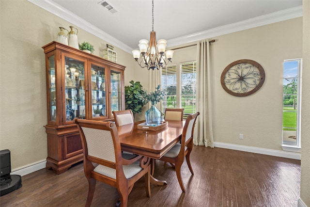 dining room with visible vents, dark wood finished floors, baseboards, a chandelier, and ornamental molding