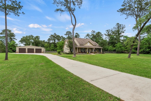 view of front of house with a porch, a garage, a front lawn, and fence