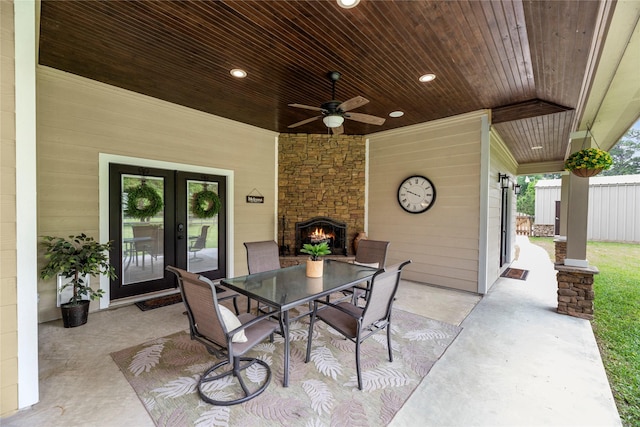 view of patio / terrace featuring a ceiling fan and outdoor dining space