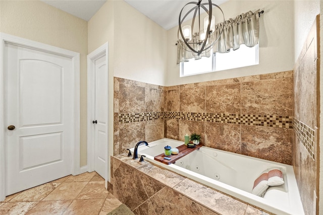 full bathroom with a whirlpool tub and a chandelier