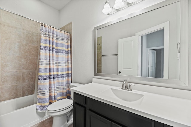 full bath featuring vanity, shower / bath combo with shower curtain, and toilet