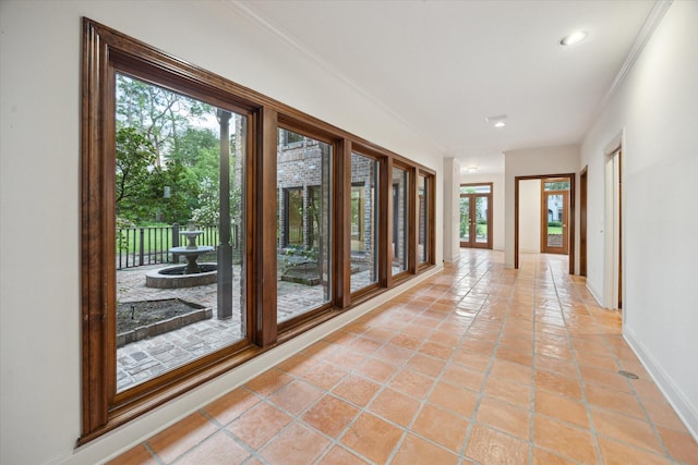5040 Fieldwood Dr, Houston, TX 77056 - hall with light tile patterned floors, baseboards, ornamental molding, and recessed lighting