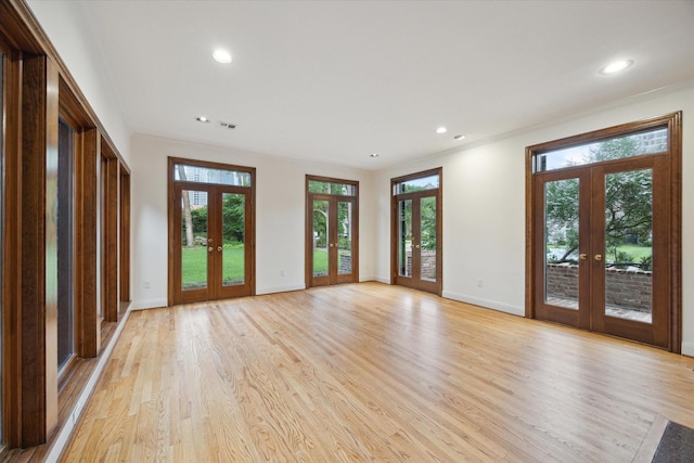 5040 Fieldwood Dr, Houston, TX 77056 - interior space with baseboards, light wood-style floors, french doors, and recessed lighting