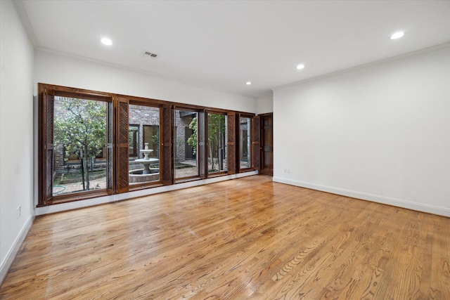 5040 Fieldwood Dr, Houston, TX 77056 - unfurnished room featuring recessed lighting, light wood finished floors, and crown molding