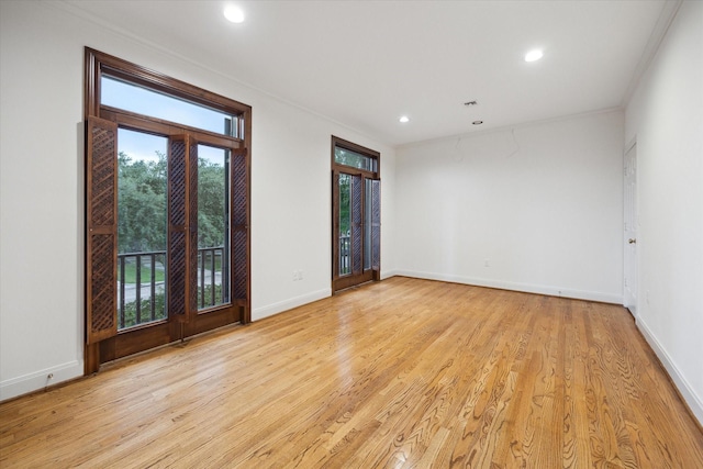 5040 Fieldwood Dr, Houston, TX 77056 - unfurnished room with light wood-style floors, a healthy amount of sunlight, and recessed lighting