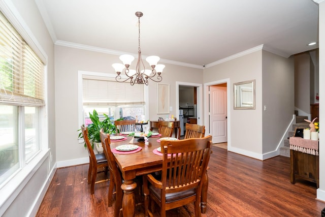 dining area featuring crown molding, baseboards, dark wood finished floors, and a notable chandelier