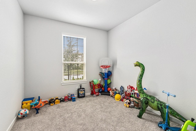 9118 Brixham Dr, Cypress, TX 77433 - playroom with healthy amount of natural light, carpet, and baseboards