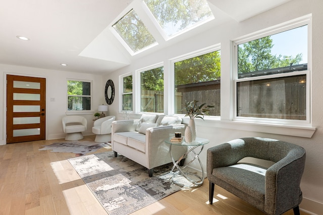 sunroom featuring a skylight