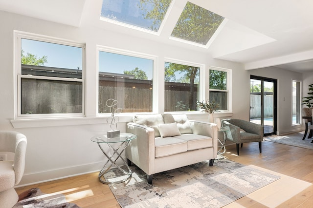 sunroom / solarium featuring a skylight
