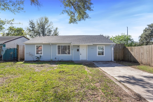 3450 Lydia St, Houston, TX 77021 - ranch-style home with fence, a shingled roof, driveway, and a front yard