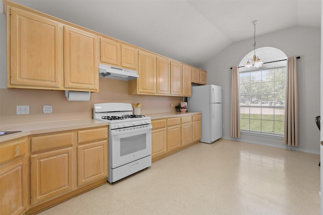 kitchen with white appliances, under cabinet range hood, lofted ceiling, and light brown cabinets