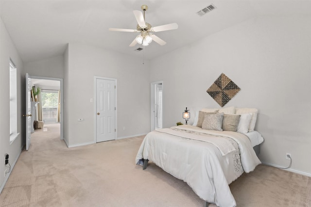 bedroom featuring baseboards, light colored carpet, and visible vents