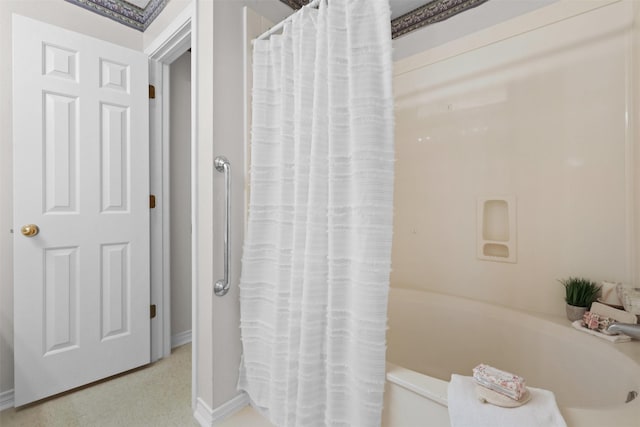 full bathroom with baseboards