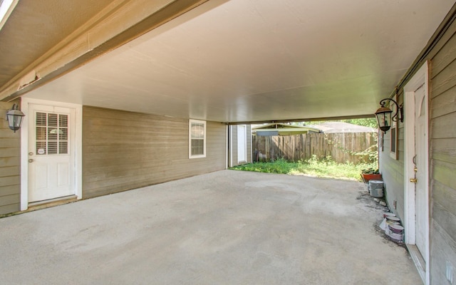 view of patio featuring fence