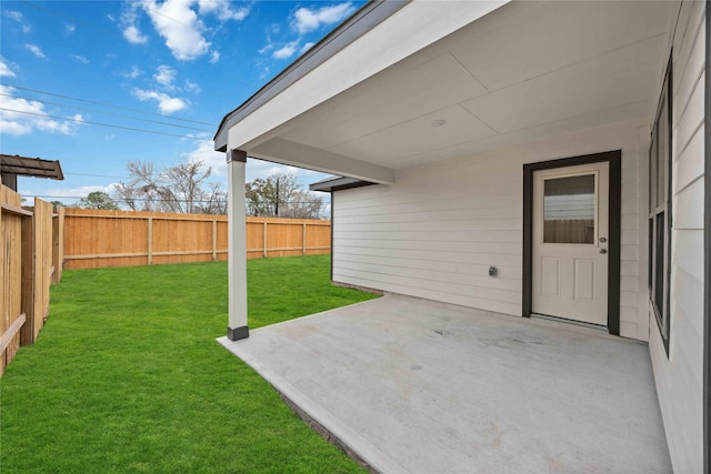view of yard featuring a patio and a fenced backyard