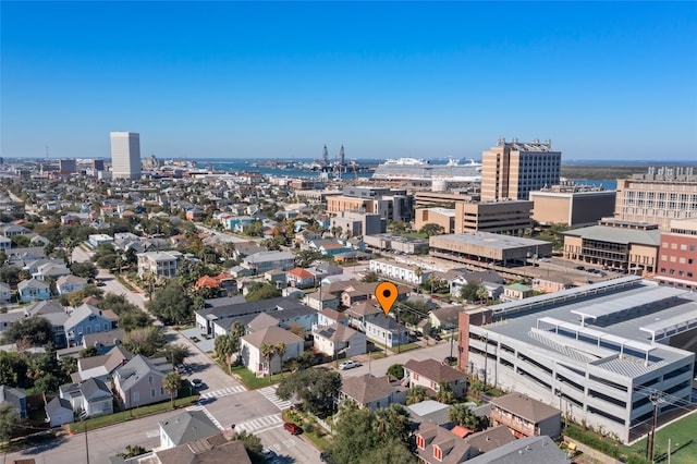 birds eye view of property featuring a city view