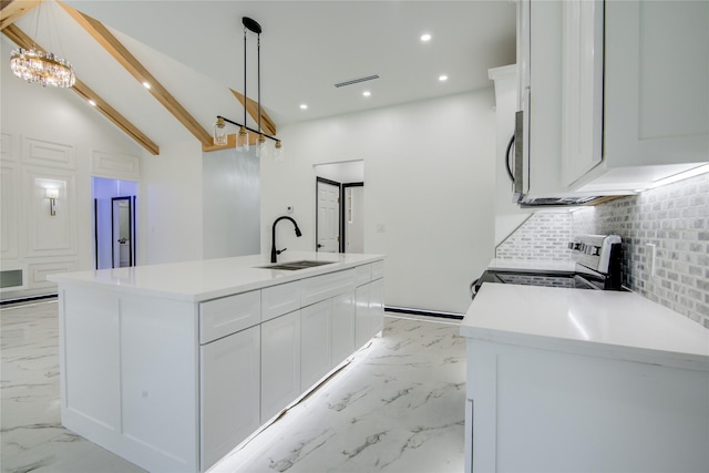 712 Sealy St, Clute, TX 77531 - kitchen with tasteful backsplash, a sink, white cabinets, marble finish floor, and stainless steel appliances