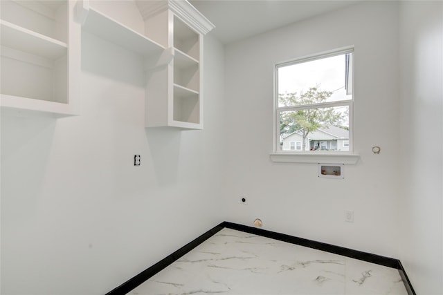 712 Sealy St, Clute, TX 77531 - laundry room with laundry area, marble finish floor, washer hookup, and electric dryer hookup