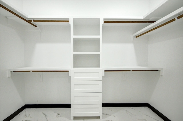 712 Sealy St, Clute, TX 77531 - walk in closet featuring marble finish floor