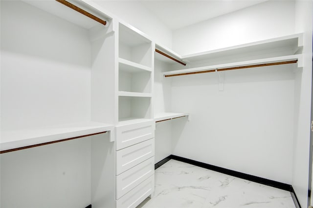 712 Sealy St, Clute, TX 77531 - walk in closet featuring marble finish floor