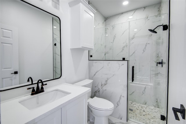 712 Sealy St, Clute, TX 77531 - full bathroom with toilet, a marble finish shower, marble finish floor, and vanity