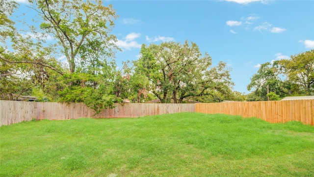 712 Sealy St, Clute, TX 77531 - view of yard featuring a fenced backyard
