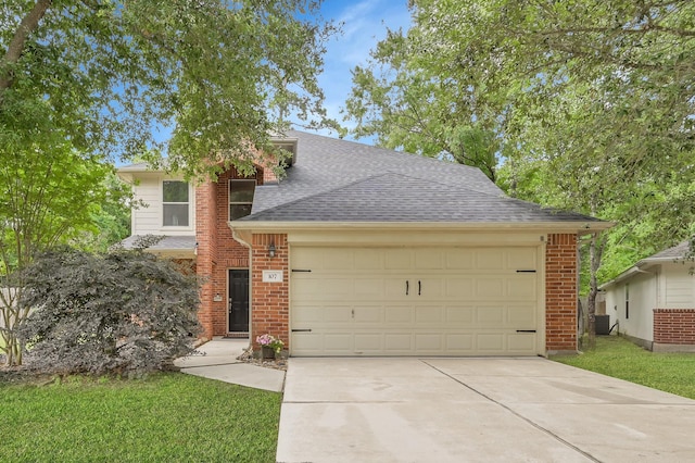 view of front of home featuring an attached garage, a shingled roof, brick siding, and concrete driveway