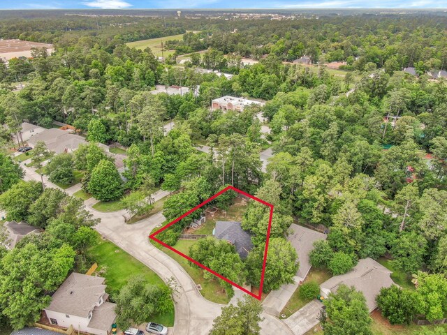 drone / aerial view with a forest view