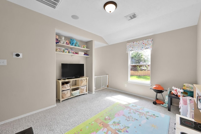 rec room with visible vents, baseboards, and carpet floors