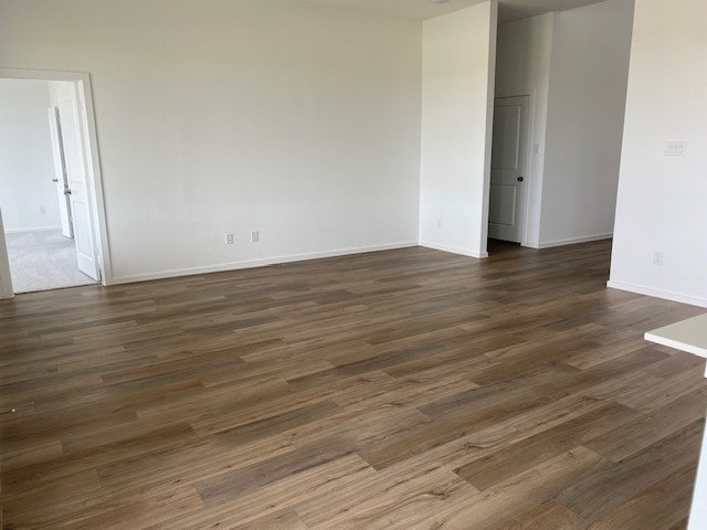 3049 Harrier Dr, Katy, TX 77493 - spare room with baseboards and dark wood finished floors