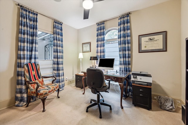 office area featuring carpet and a ceiling fan