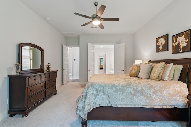 9726 Dani Lake Dr, Tomball, TX 77375 - bedroom with light carpet, baseboards, and a ceiling fan