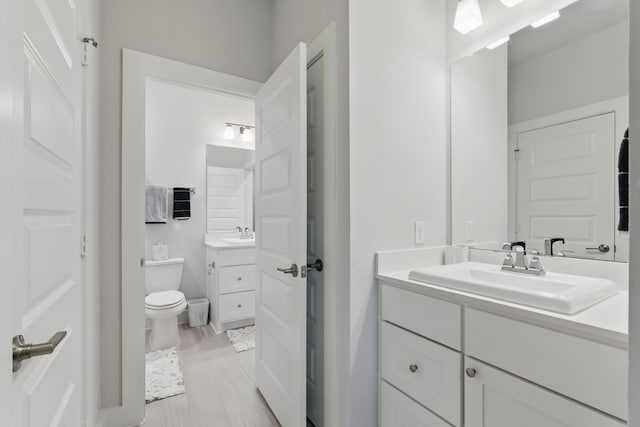 9726 Dani Lake Dr, Tomball, TX 77375 - bathroom with toilet and two vanities