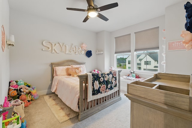 9726 Dani Lake Dr, Tomball, TX 77375 - carpeted bedroom featuring ceiling fan
