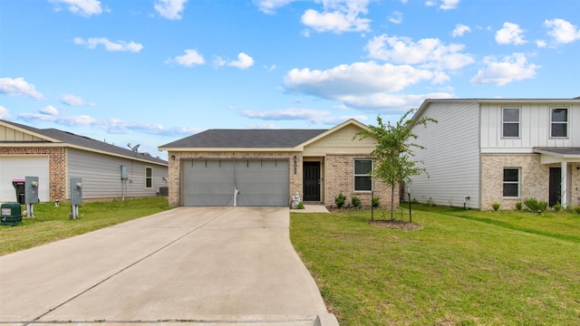 15515 Taylorcrest Dr, Conroe, TX 77306 - view of front of house with brick siding, an attached garage, driveway, and board and batten siding
