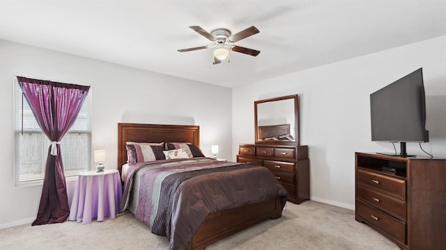 15515 Taylorcrest Dr, Conroe, TX 77306 - bedroom featuring light colored carpet, baseboards, and ceiling fan