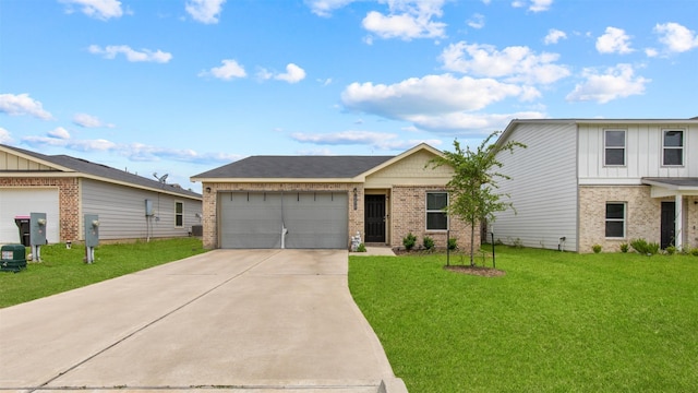 15515 Taylorcrest Dr, Conroe, TX 77306 - view of front facade with brick siding, a garage, driveway, a front lawn, and board and batten siding