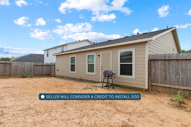 15515 Taylorcrest Dr, Conroe, TX 77306 - back of house featuring a fenced backyard