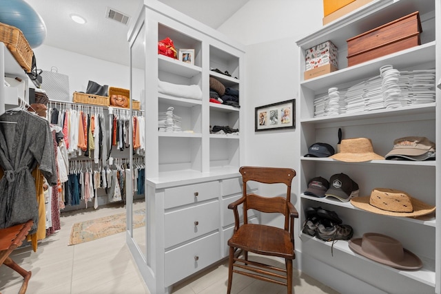 walk in closet with visible vents