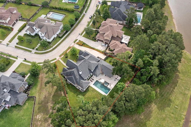 3302 S Vista Lake Ln, Spring, TX 77386 - aerial perspective of suburban area featuring property parcel outlined and a pool area