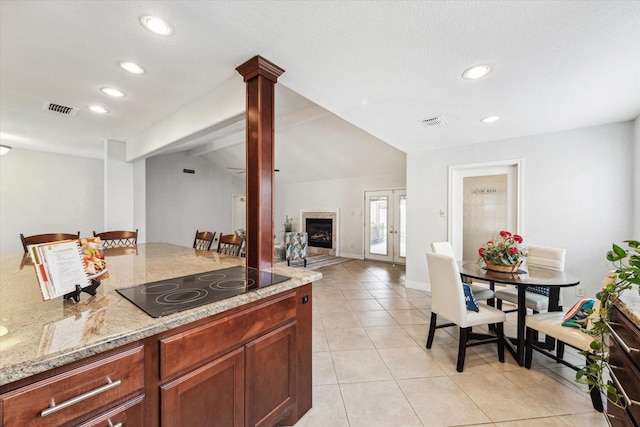 kitchen featuring visible vents, recessed lighting, black electric cooktop, and light tile patterned floors