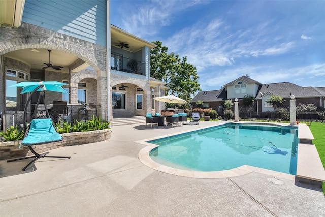 view of swimming pool with fence, a patio, an outdoor hangout area, a fenced in pool, and a ceiling fan