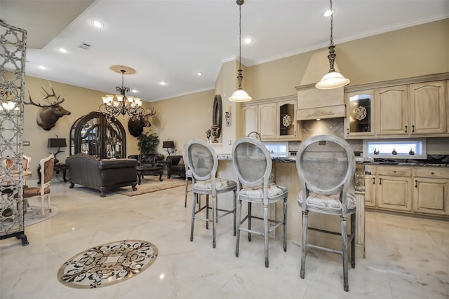 kitchen featuring crown molding, an inviting chandelier, light brown cabinetry, a breakfast bar, and glass insert cabinets