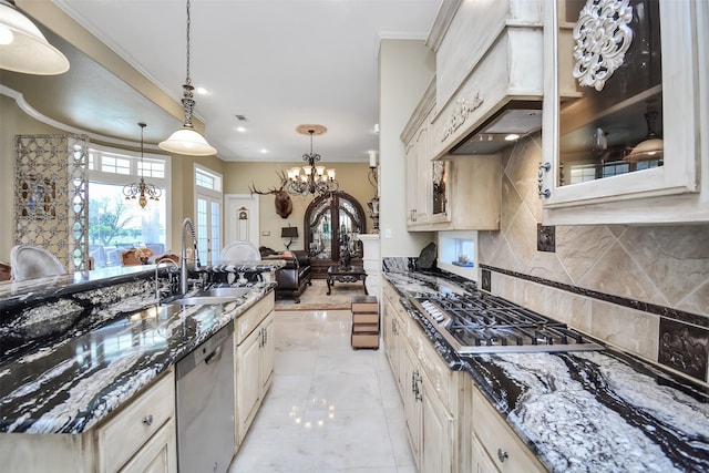 kitchen with glass insert cabinets, appliances with stainless steel finishes, a sink, custom exhaust hood, and an inviting chandelier