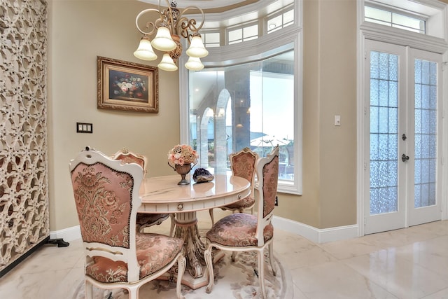 dining area featuring an inviting chandelier, baseboards, plenty of natural light, and french doors