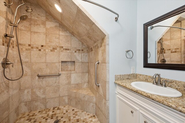 4107 Pebble Beach Dr, League City, TX 77573 - bathroom featuring a tile shower and vanity